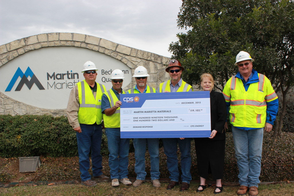 Martin Marietta is awarded check from CPS Energy for reducing energy usage.